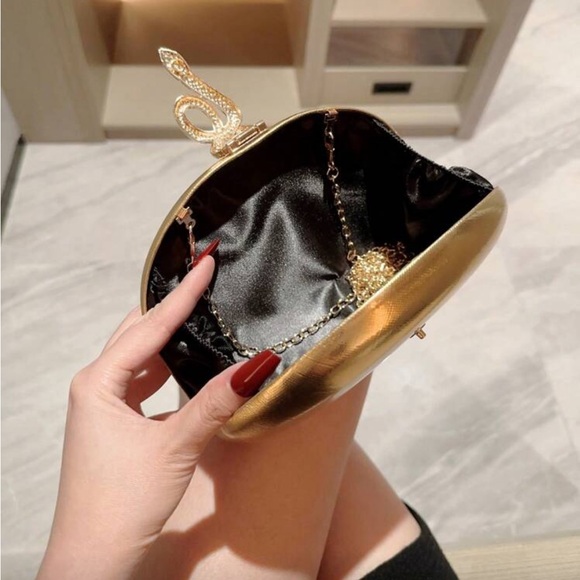 Gold Clutch with Snake Accent